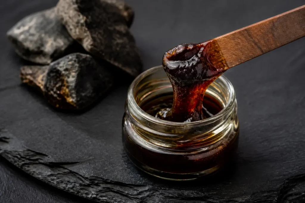 Shilajit resin in glass jar